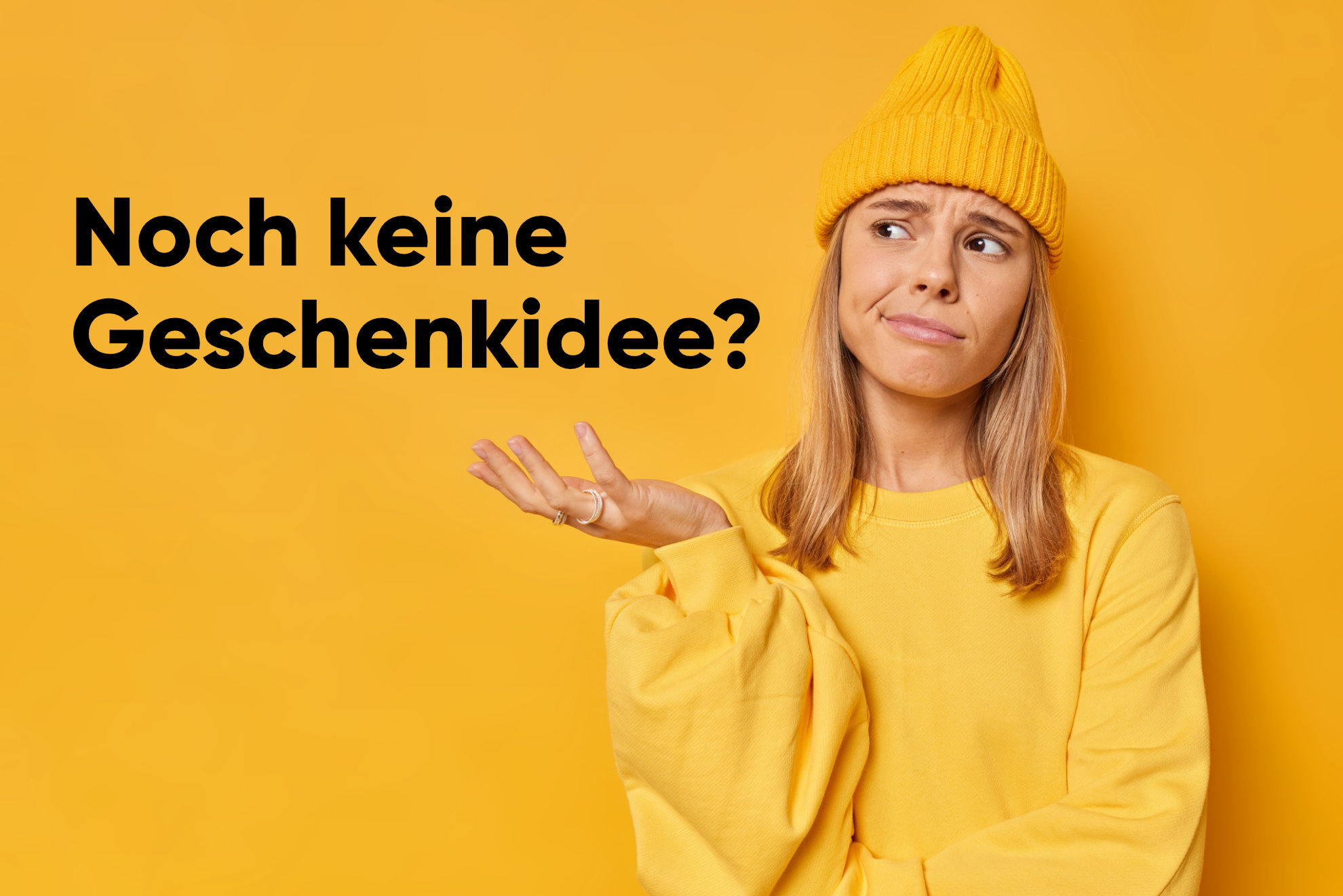 Displeased hesitant young woman raises palm shrugs shoulders has indecisive expression faces difficult choice wears hat and sweatshirt isolated over yellow background with blank copy space aside